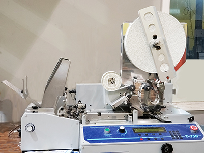 Tabbing machine